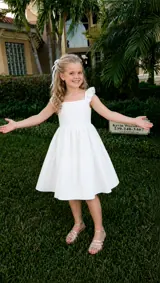 AI-generated Sorry I Lied trend step 3: the floral dress becomes a white dress